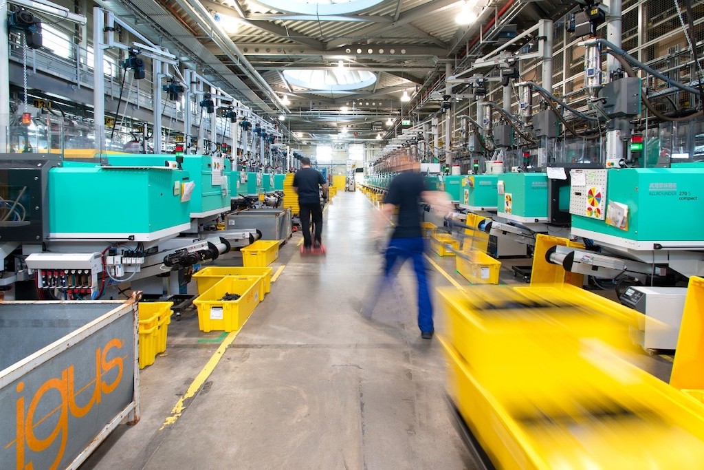 A total of 500 new injection-molding machines are being installed at igus GmbH in Cologne; 100 older ones have been replaced with 40% more energy-efficient models. By 2025, igus wants its production to be climate-neutral and says it is 95% there. Courtesy: igus GmbH