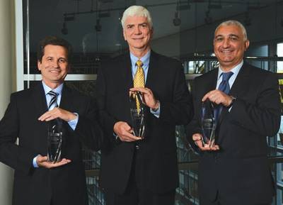 Representing the 2014 System Integrators of the Year are (from left) Dr. Vladimir Morenko, Director General of Insist Avtomatika; Richard Seale, President of the Automation Business Unit at Wood Group Mustang; and Bijan Shams, President of Cogent Industri